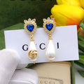 Gucci Teardrop Pearl Earrings - album image 1