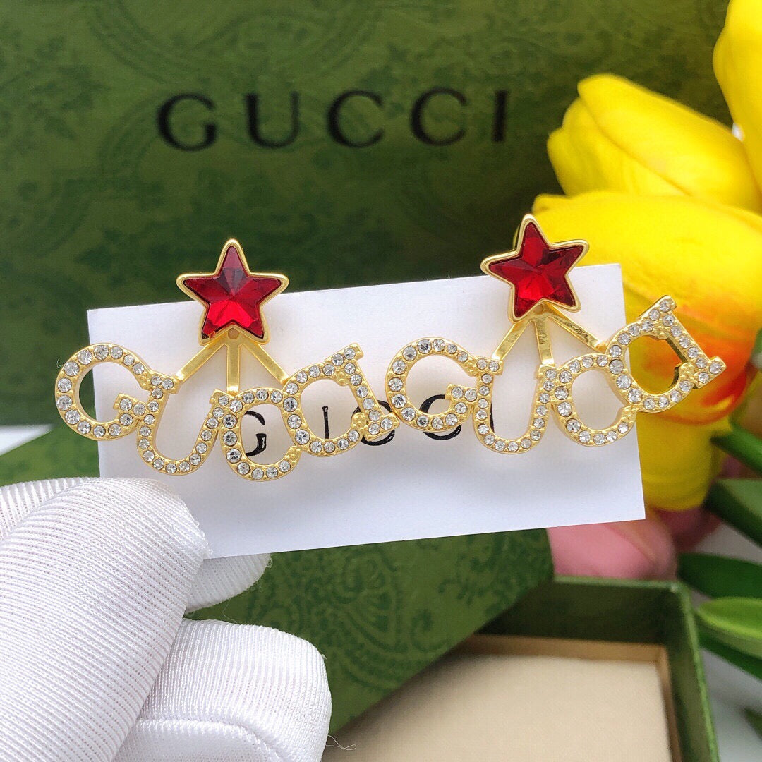 Gucci Red Star Crystal Accent Earrings - album image 1