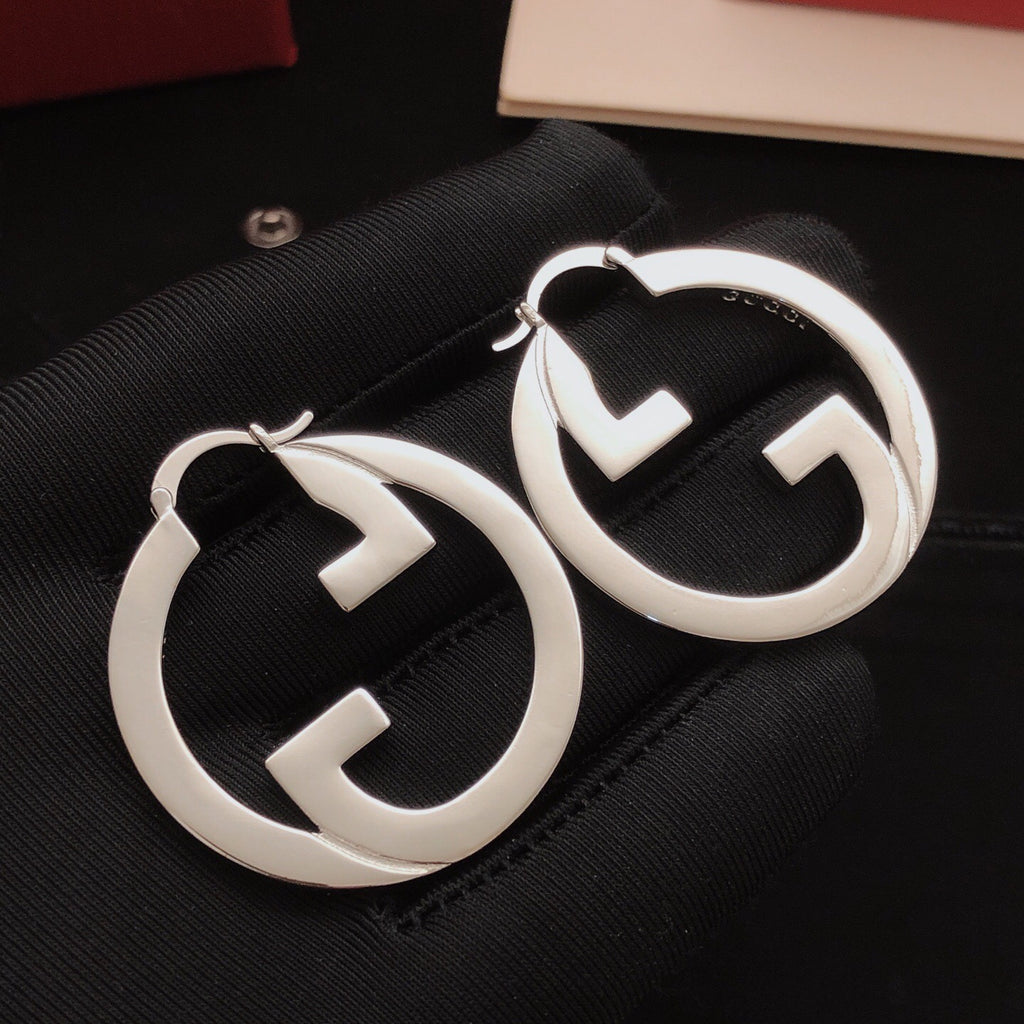 Gucci Circular Polished Earrings - album image 1