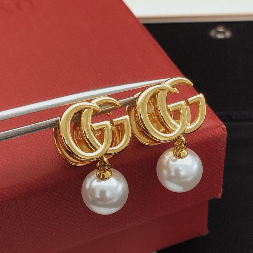 Gucci Pearl Earrings - album image 1
