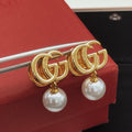 Gucci Pearl Earrings - album image 1