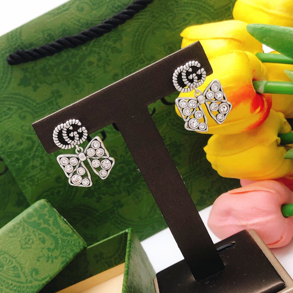 Gucci Interlocking G Bow Butterfly Silver-Tone Gold-Tone Earrings - album image 7