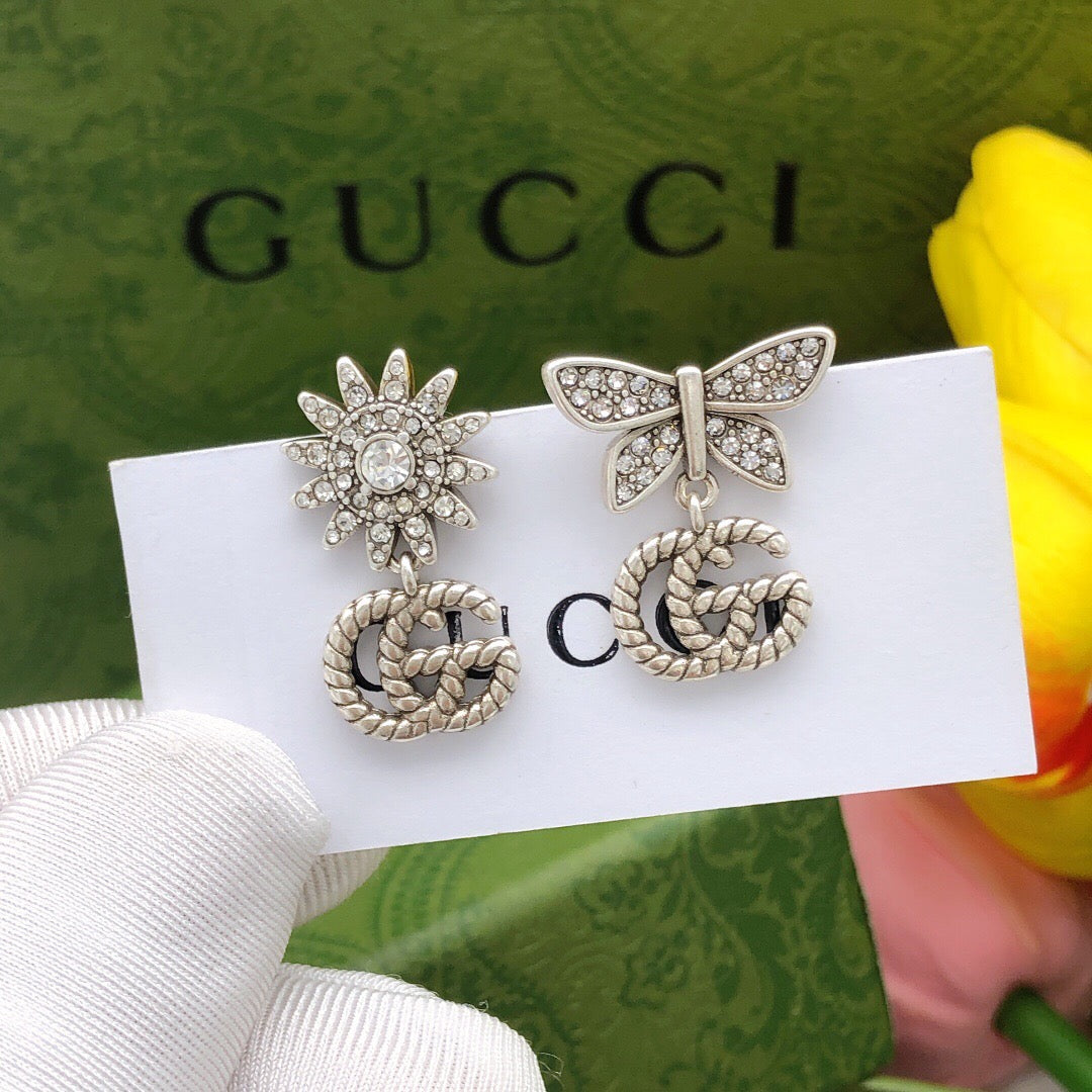 Gucci Interlocking G Bow Butterfly Earrings - album image 1