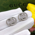Gucci Interlocking G Silver-Tone Twisted Stud Earrings - album image 1