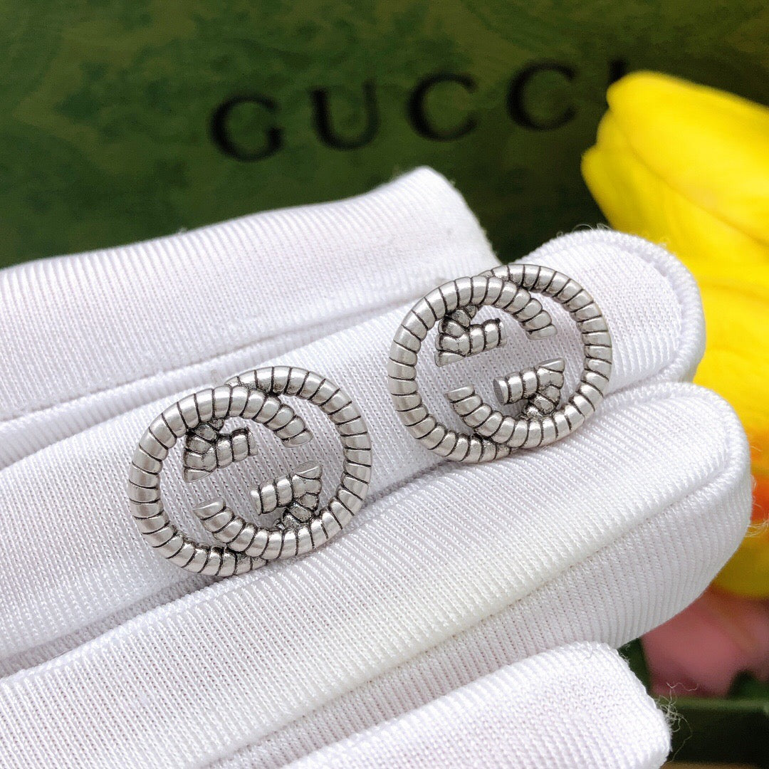 Gucci Interlocking G Silver-Tone Twisted Stud Earrings - album image 1