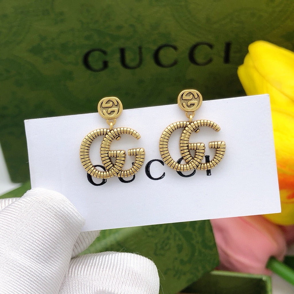 Gucci Interlocking G Twisted Earrings - album image 1
