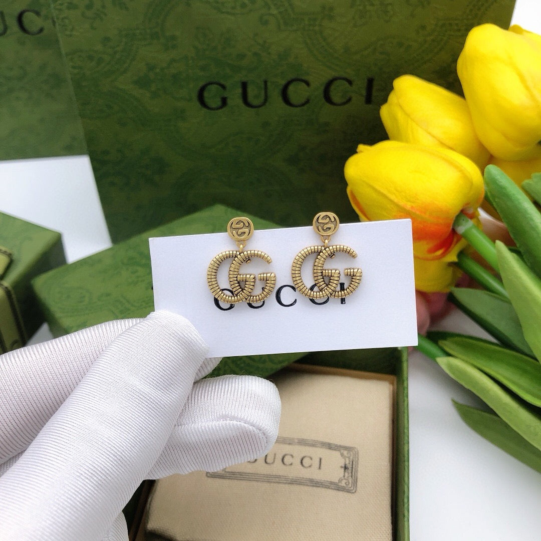 Gucci Interlocking G Twisted Earrings - album image 6