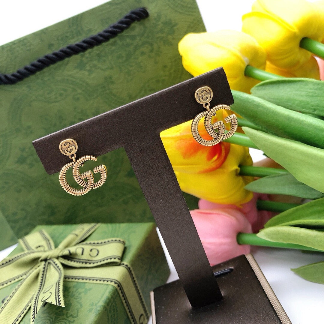 Gucci Interlocking G Twisted Earrings - album image 7