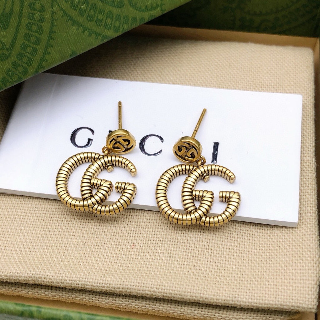 Gucci Interlocking G Twisted Earrings - album image 3