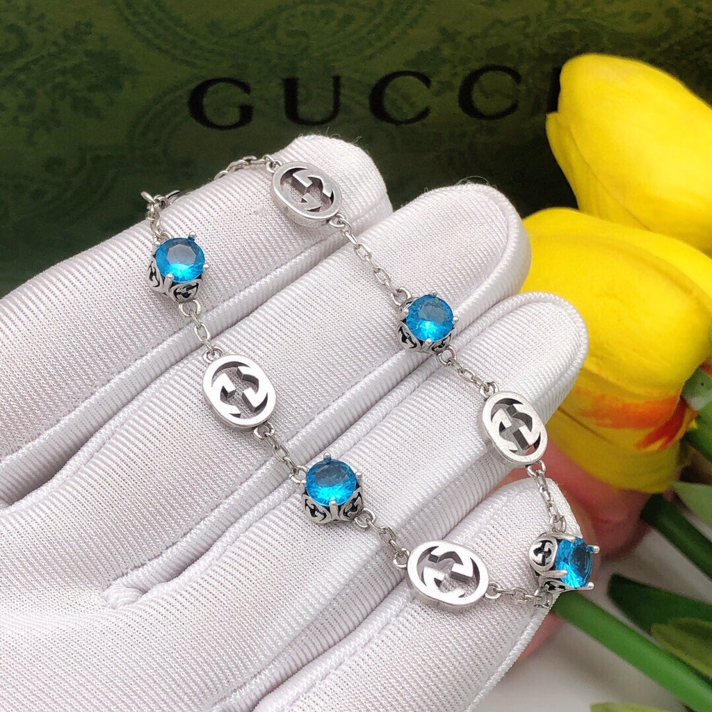 Gucci Silver-Tone Blue Crystal and G Charm Bracelet - album image 2