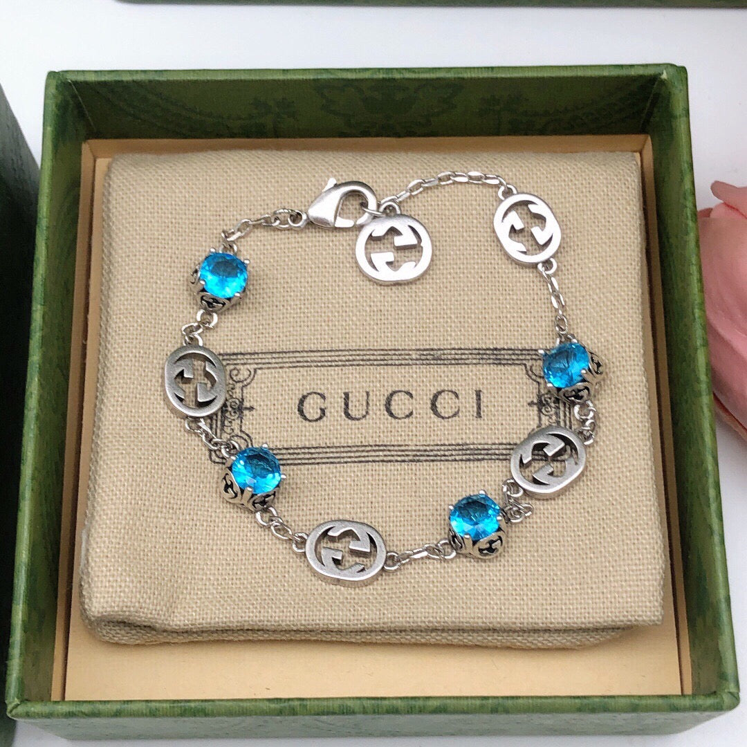 Gucci Silver-Tone Blue Crystal and G Charm Bracelet - album image 3