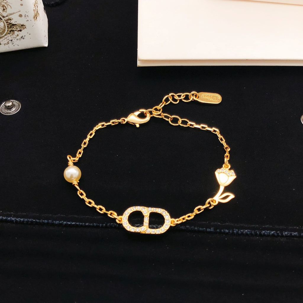 Dior Gold-Tone CD Butterfly Bracelet - product image 1