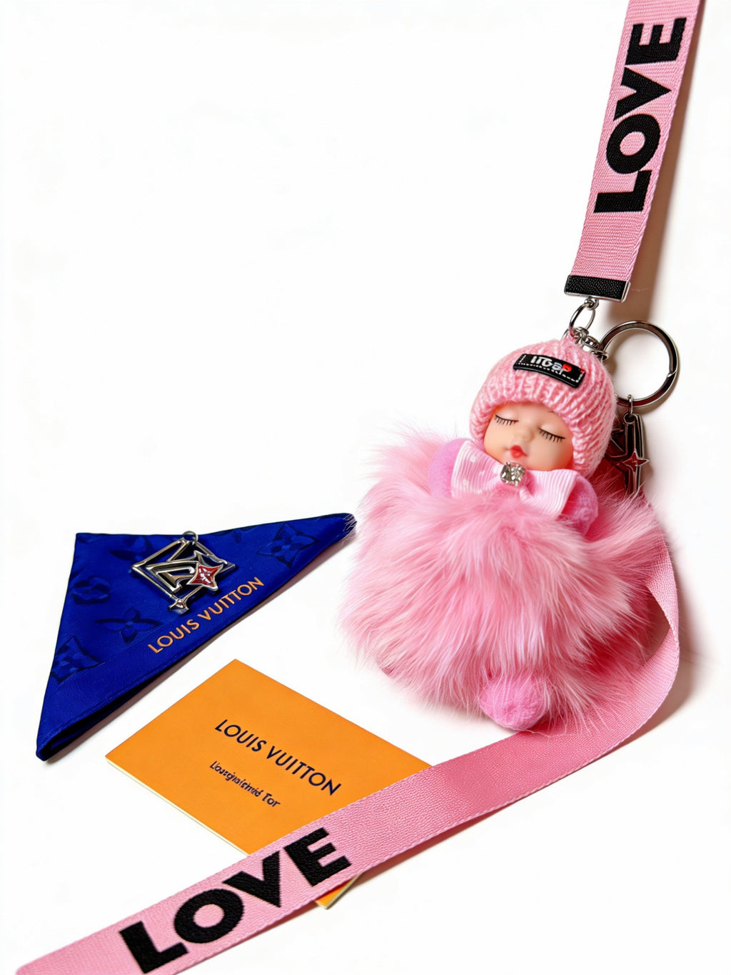 Louis Vuitton Pink Ribbon Keychain with Character Pendant - album image 3