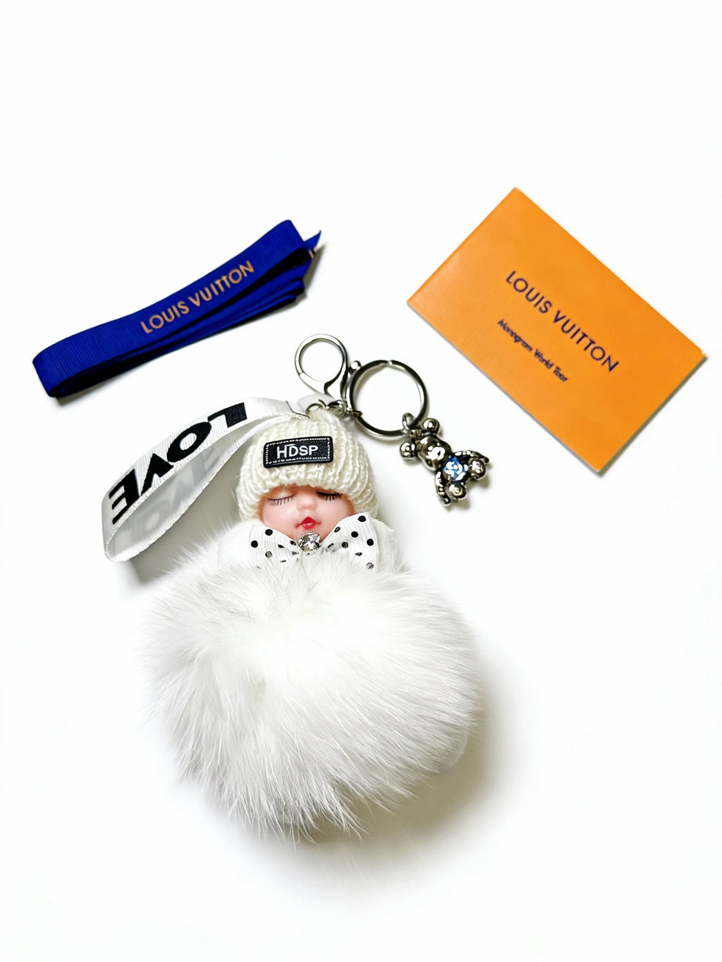 Louis Vuitton White Furry Ball Keychain - album image 3
