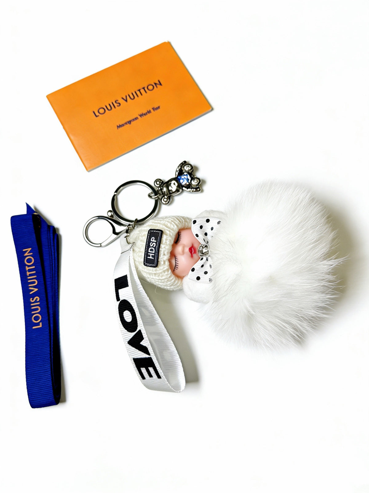 Louis Vuitton White Furry Ball Keychain - album image 7