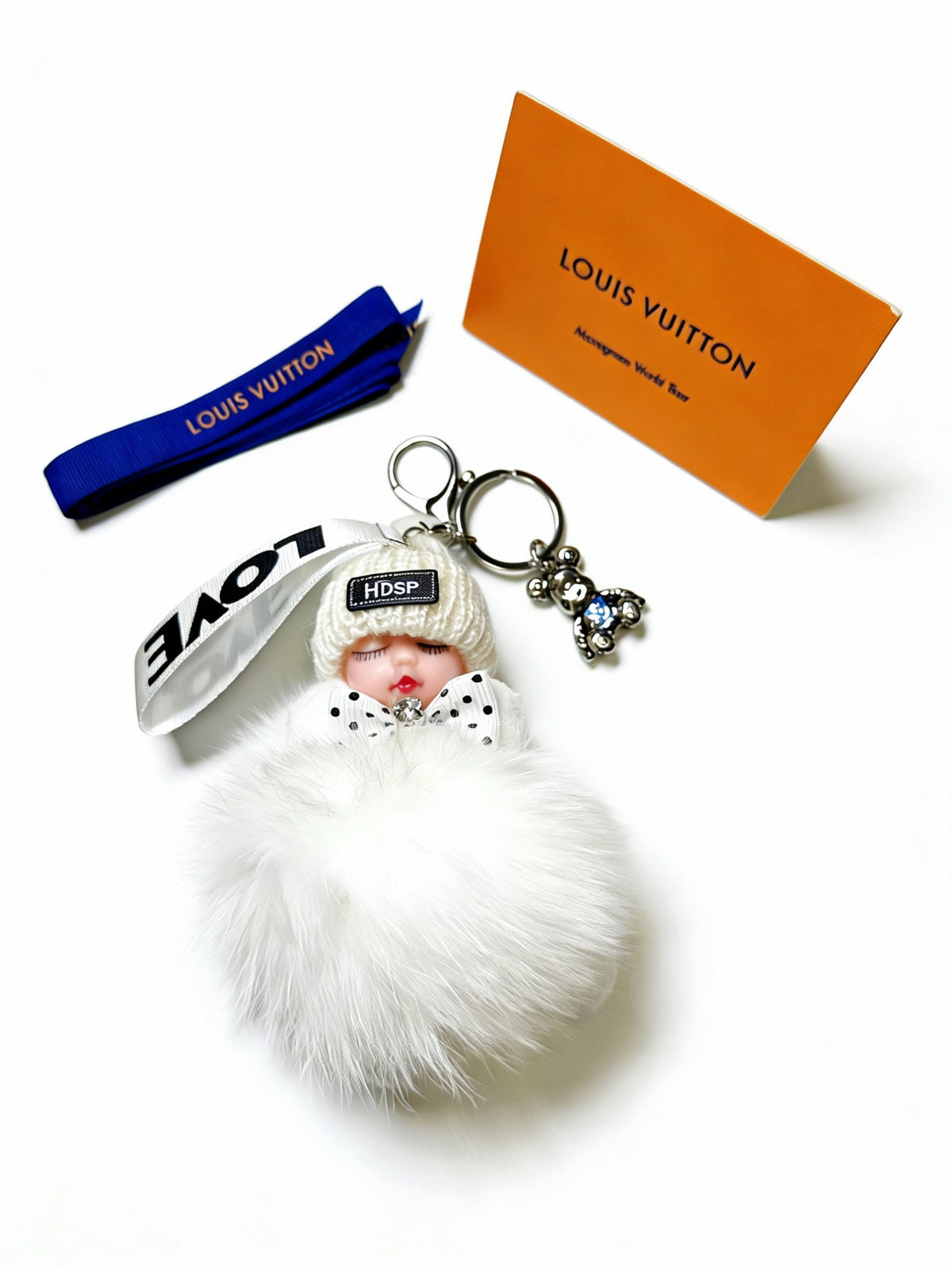 Louis Vuitton White Furry Ball Keychain - album image 4