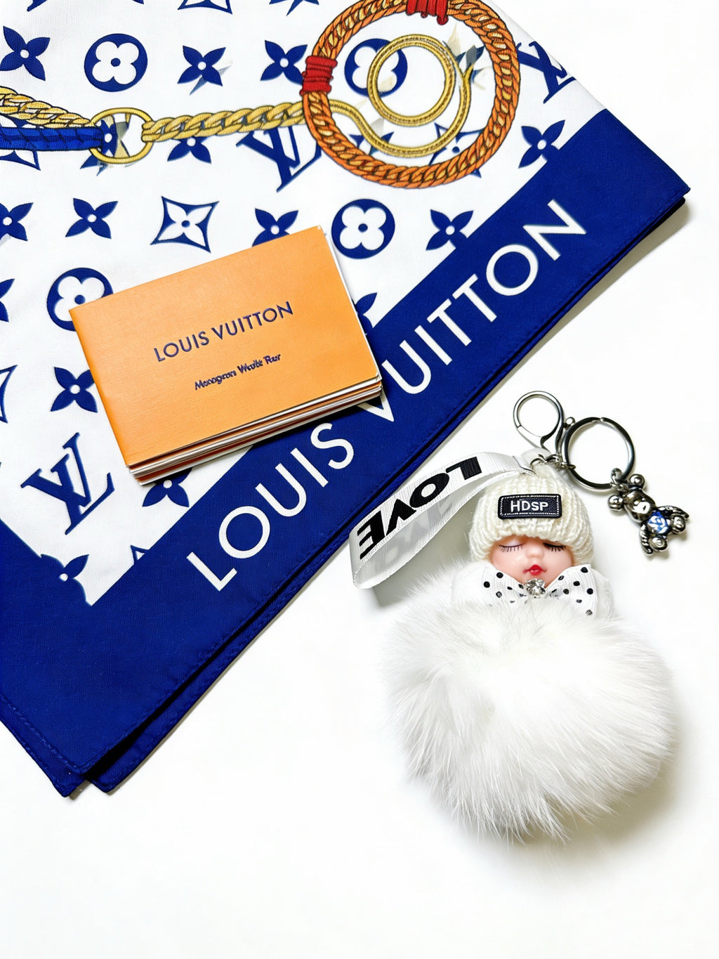 Louis Vuitton White Furry Ball Keychain - album image 5