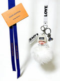 Louis Vuitton White Furry Ball Keychain - album image 1