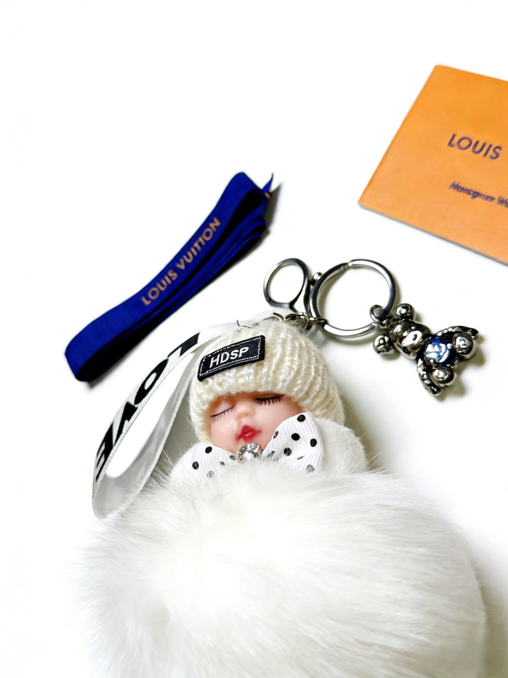 Louis Vuitton White Furry Ball Keychain - album image 8