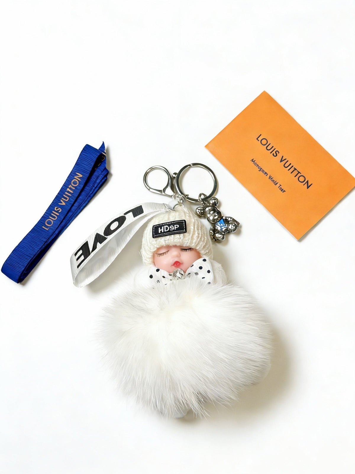 Louis Vuitton White Furry Ball Keychain - album image 2