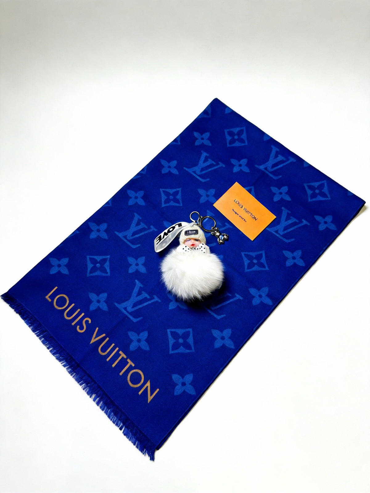 Louis Vuitton White Furry Ball Keychain - album image 6