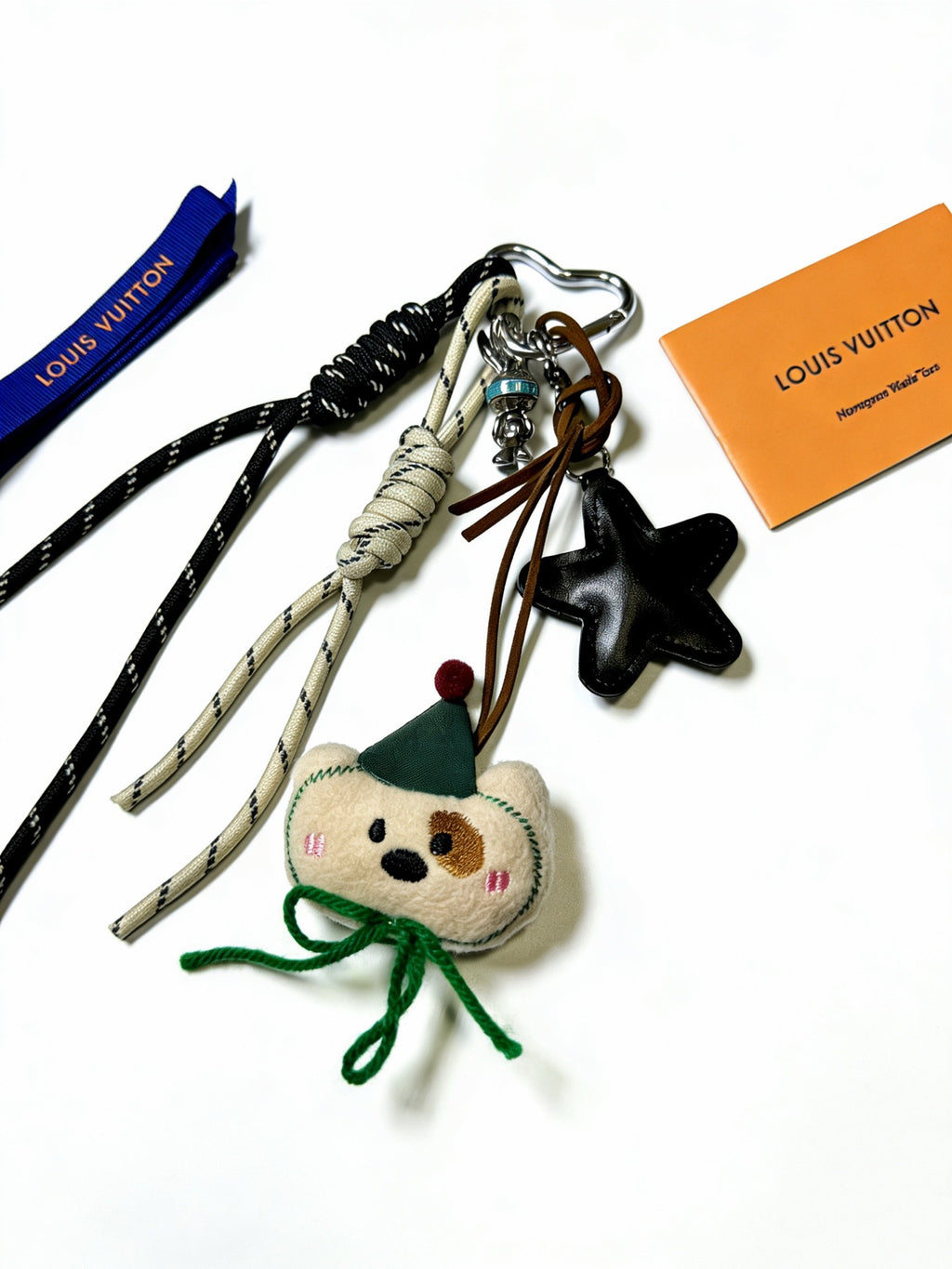 Louis Vuitton Braided Strap Keychain with Character Pendant - album image 6