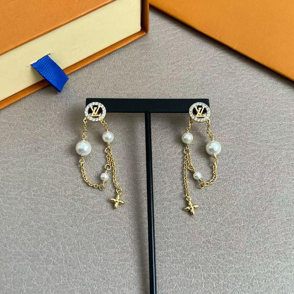 Louis Vuitton LV Letter Stud Earrings - album image 3