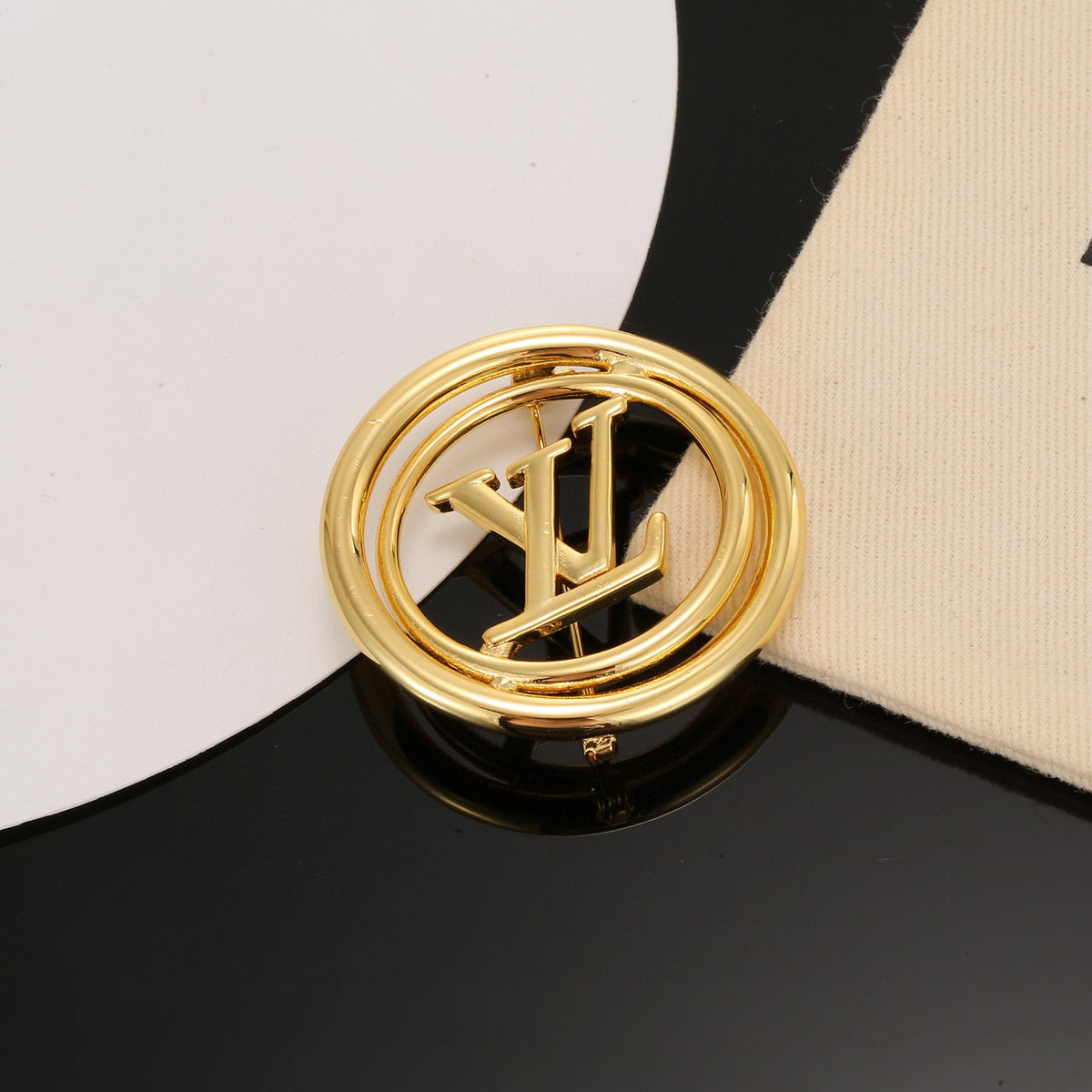 Louis Vuitton LV Letter Brooch - album image 1