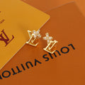Louis Vuitton Gold-Tone LV and Flower Stud Earrings - album image 1