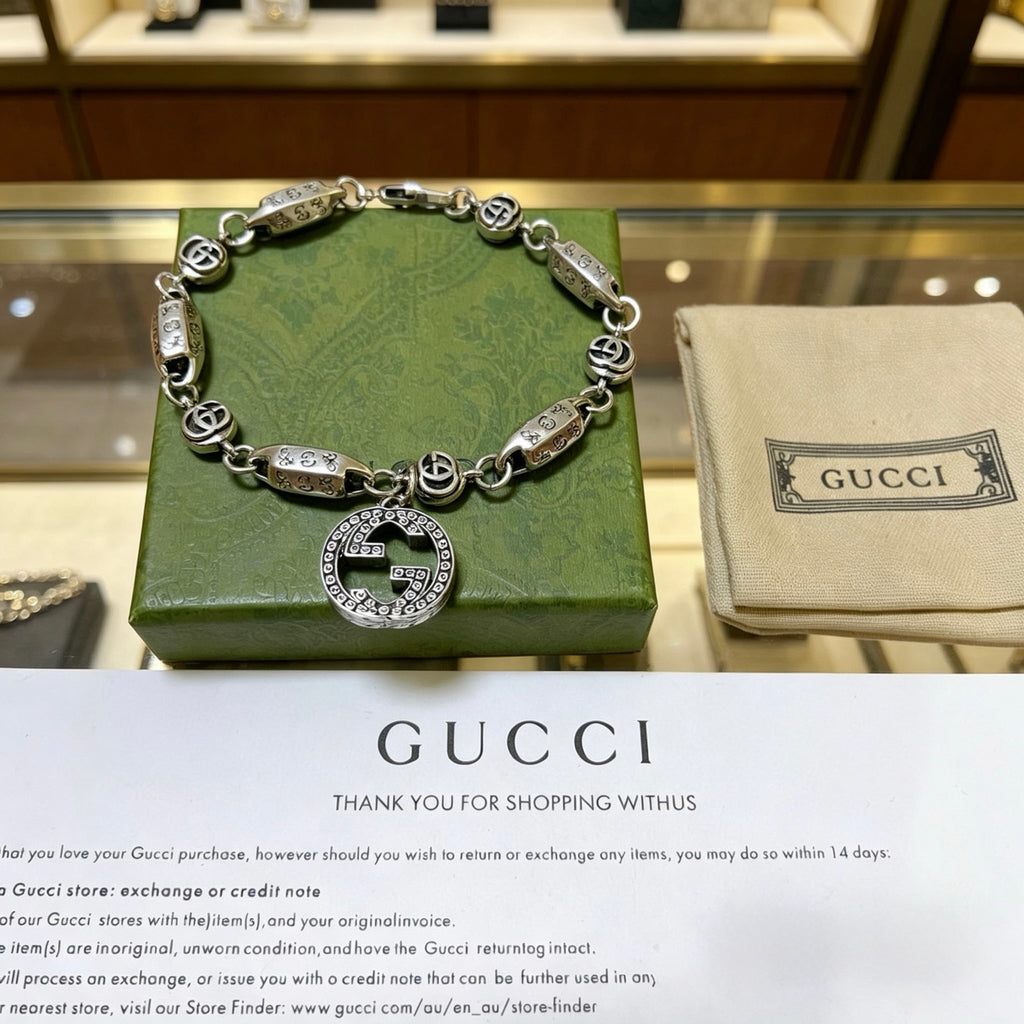 Gucci Silver-Tone Rectangular Link Bracelet with Medallion Charm - album image 4