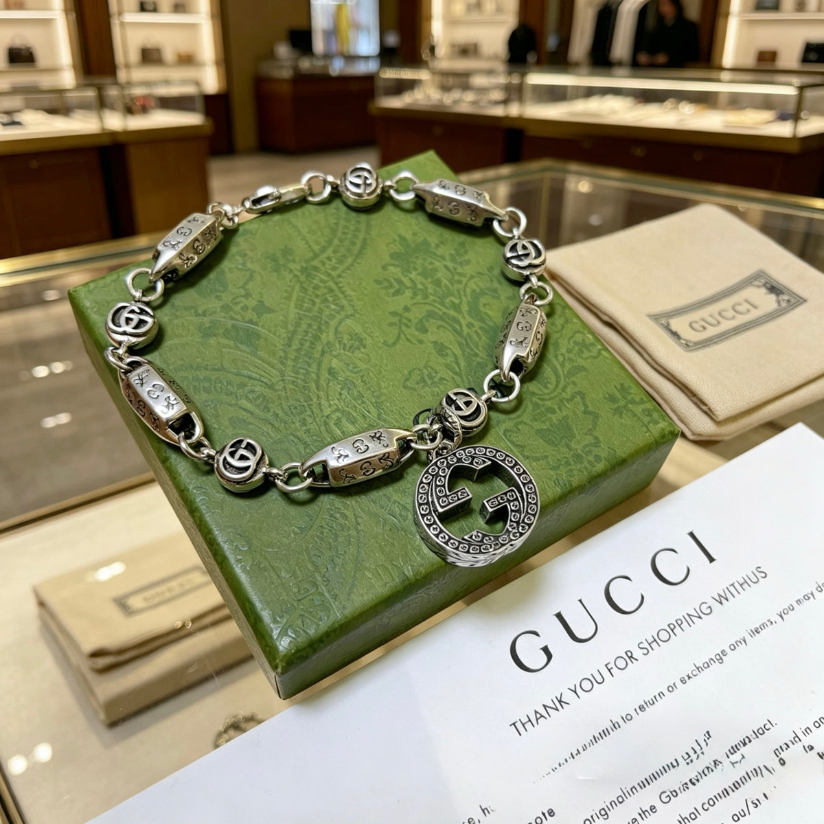 Gucci Silver-Tone Rectangular Link Bracelet with Medallion Charm - album image 3