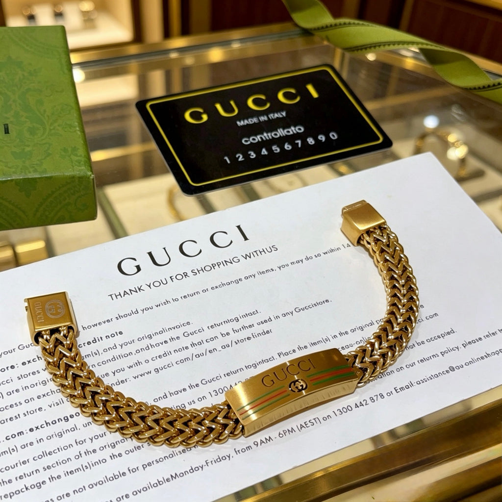 Gucci Gold-Tone Wide Woven Open Bangle - album image 1