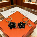 Hermès Black Flower-Charm Keychain - album image 1