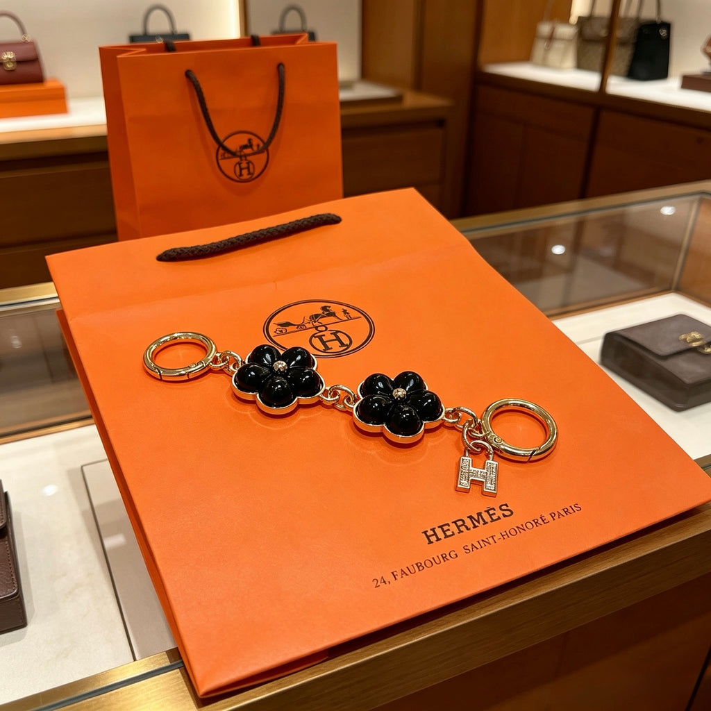 Hermès Black Flower-Charm Keychain - album image 5