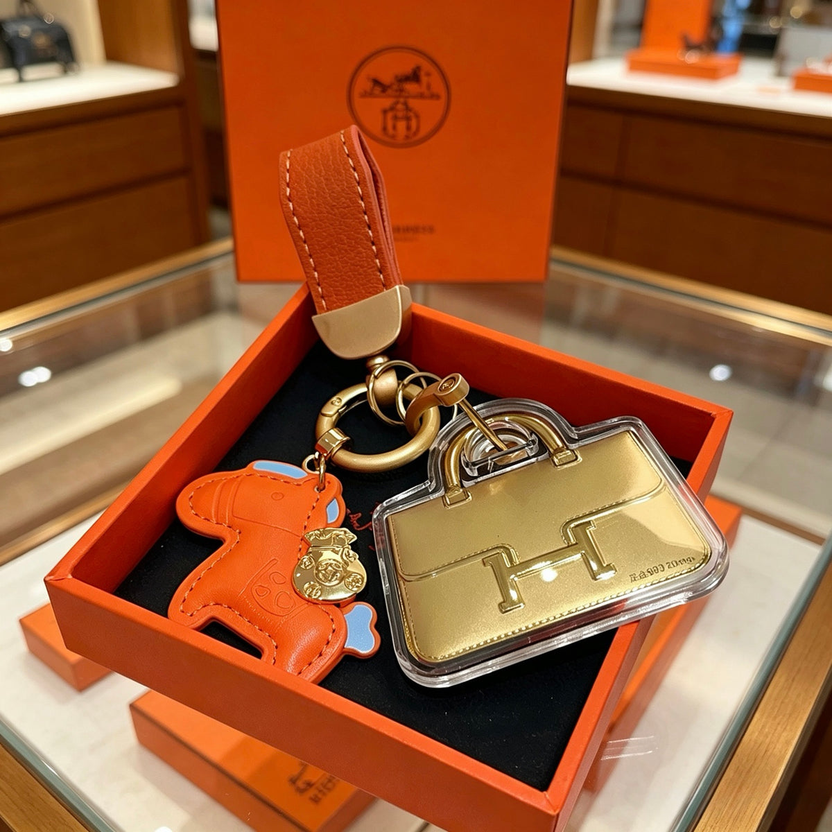 Hermès Orange Horse and Gold-Tone Handbag-Charm Keychain - album image 1
