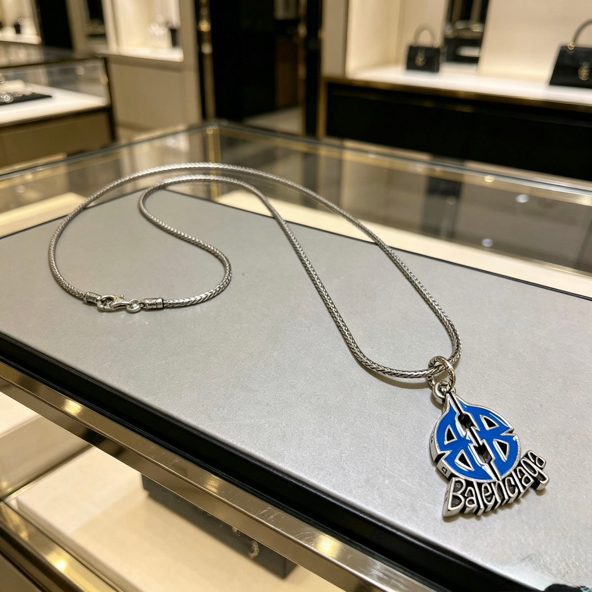 Balenciaga Silver-Tone Blue Teardrop Pendant Necklace - album image 4