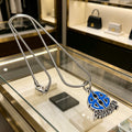 Balenciaga Silver-Tone Blue Teardrop Pendant Necklace - album image 1