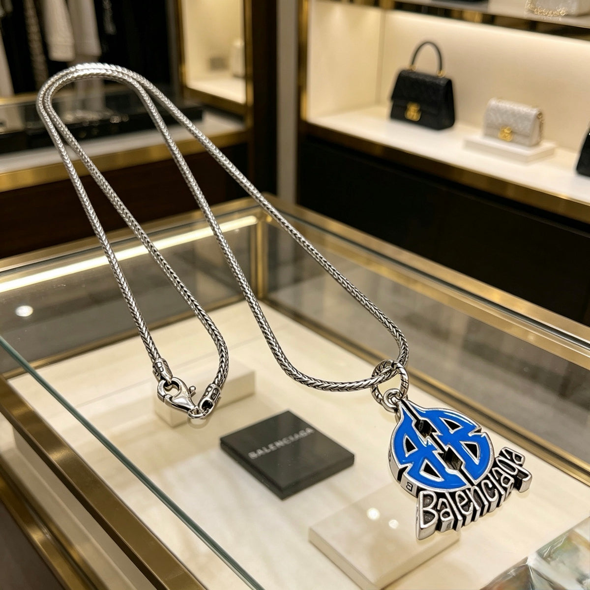 Balenciaga Silver-Tone Blue Teardrop Pendant Necklace - album image 1
