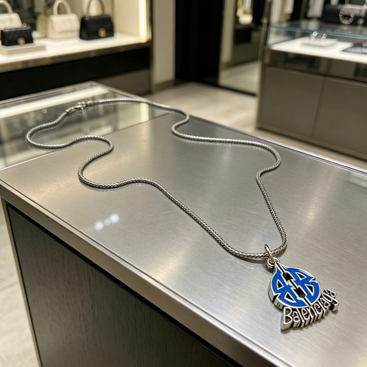 Balenciaga Silver-Tone Blue Teardrop Pendant Necklace - album image 8