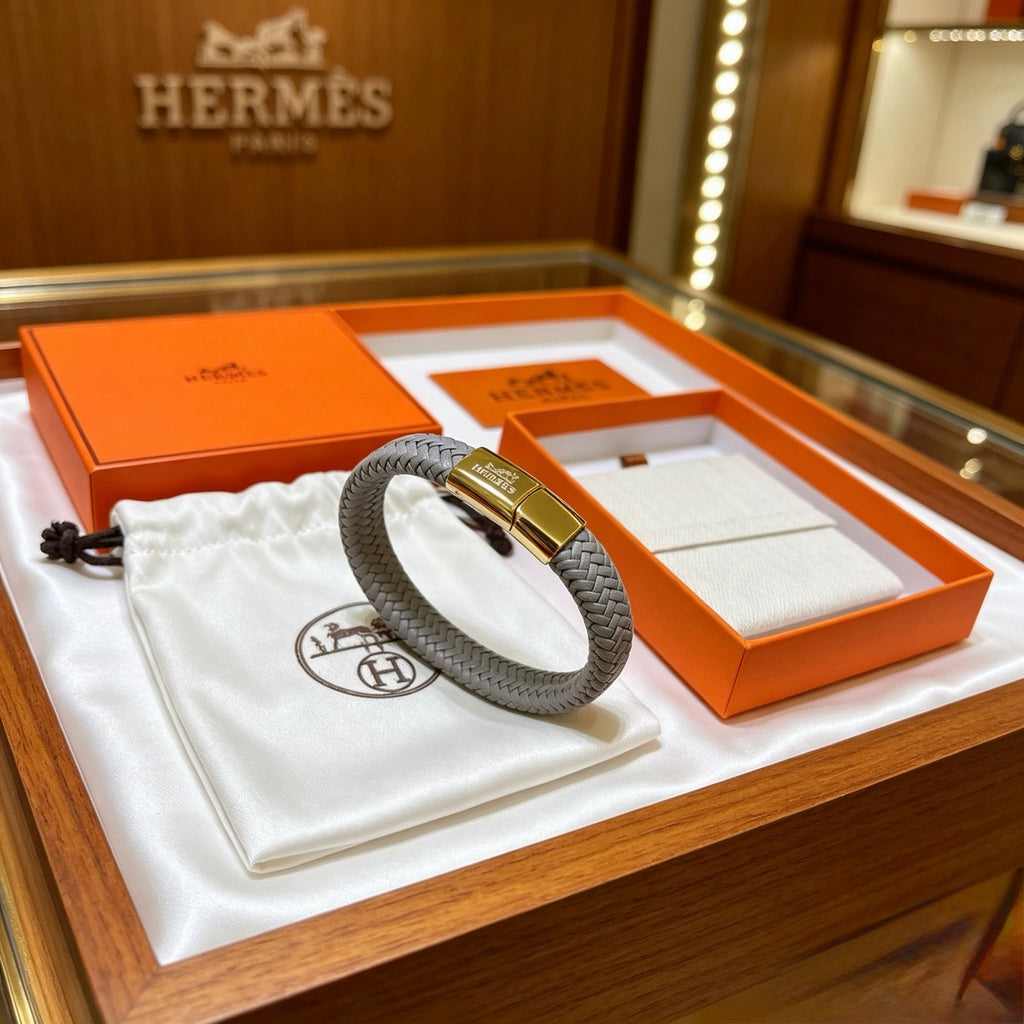Hermès Black Braided Leather Gold-Tone Clasp Bracelet - album image 2