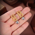 Balenciaga Gold-Tone BB and Crystal Drop Earrings - album image 1