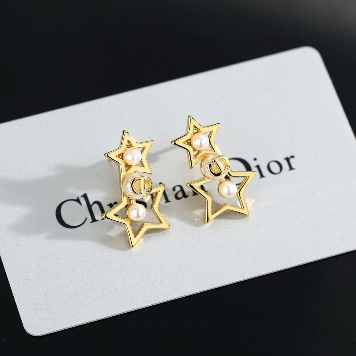 Dior Open Star Drop Earrings - product image 1