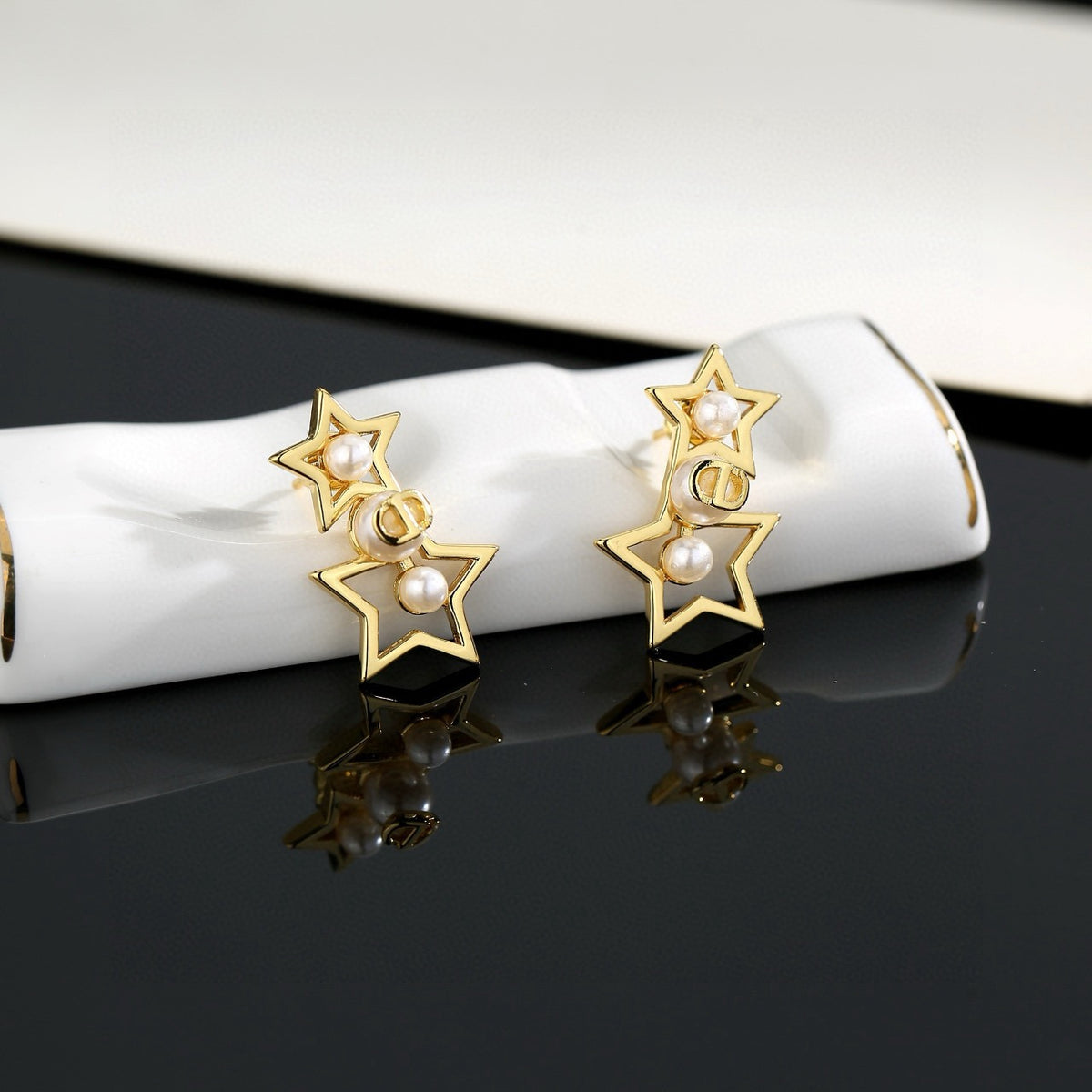 Dior Open Star Drop Earrings - product image 5