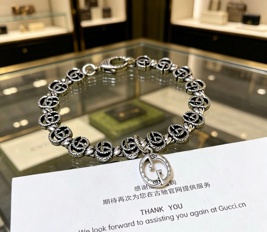 Gucci Silver-Tone G Medallion Link Bracelet with Circular Charm - album image 5