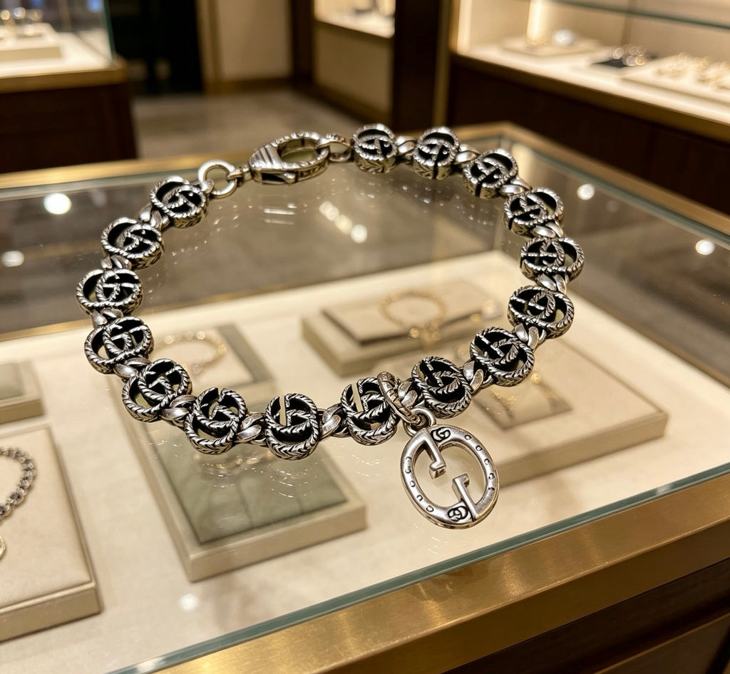 Gucci Silver-Tone G Medallion Link Bracelet with Circular Charm - album image 1