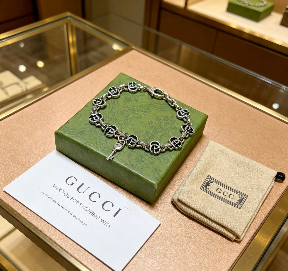 Gucci Silver-Tone GG Medallion Link Bracelet - album image 2