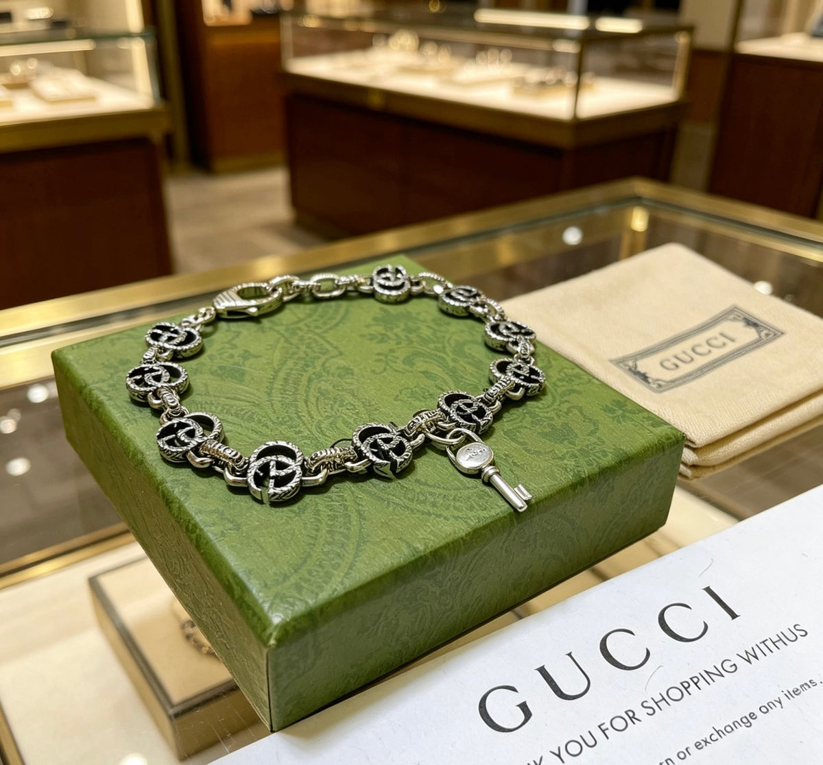 Gucci Silver-Tone GG Medallion Link Bracelet - album image 1