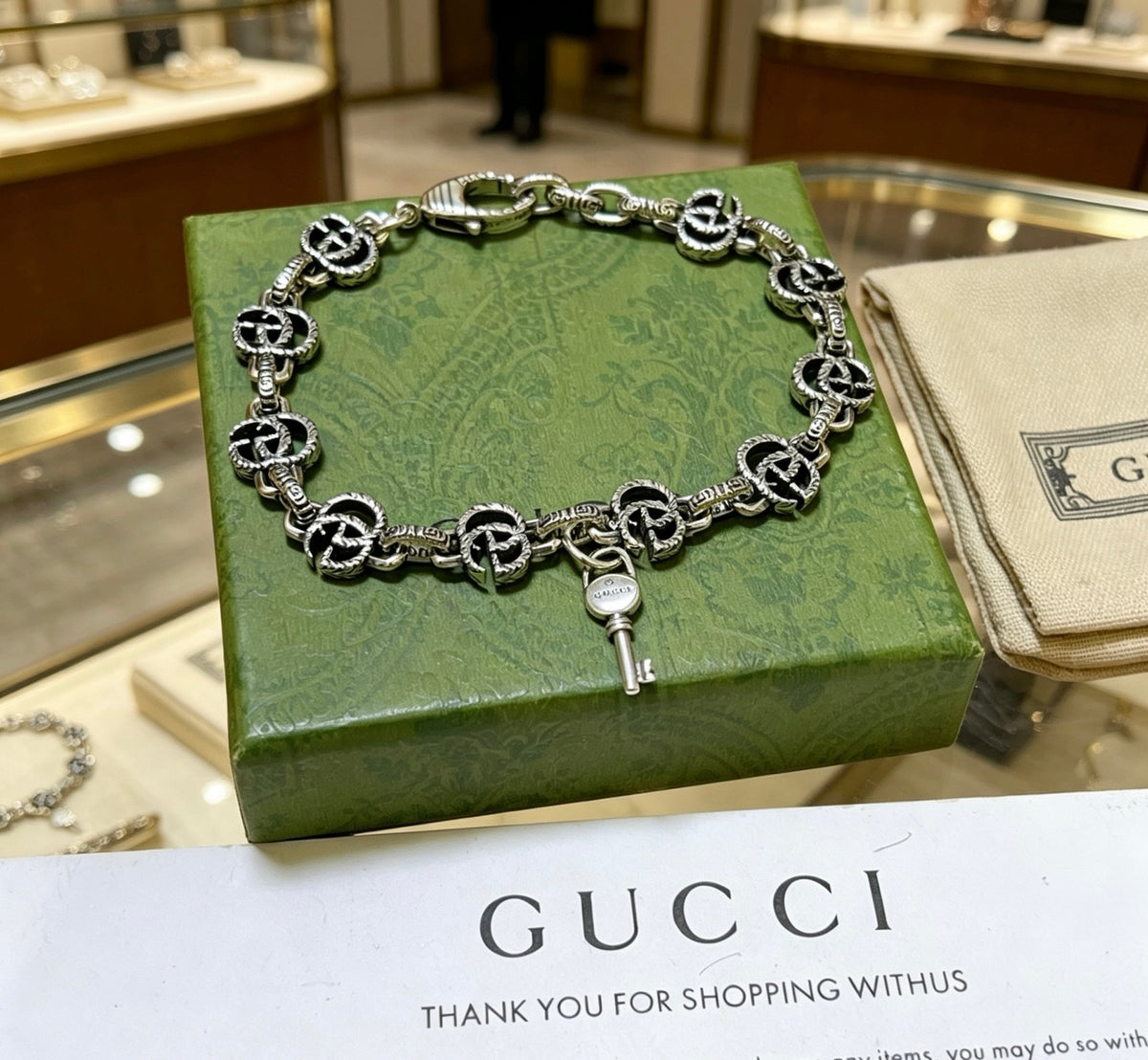 Gucci Silver-Tone GG Medallion Link Bracelet - album image 8