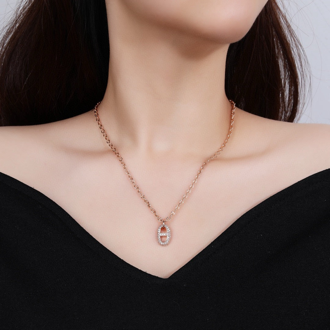 Hermès Silver and Rose Gold-Tone Anchor Pendant Necklace - album image 2