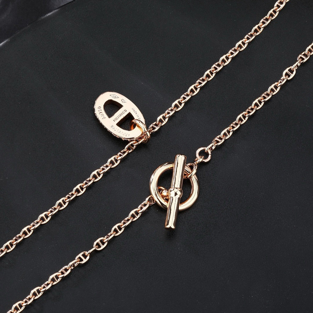 Hermès Silver and Rose Gold-Tone Anchor Pendant Necklace - album image 5